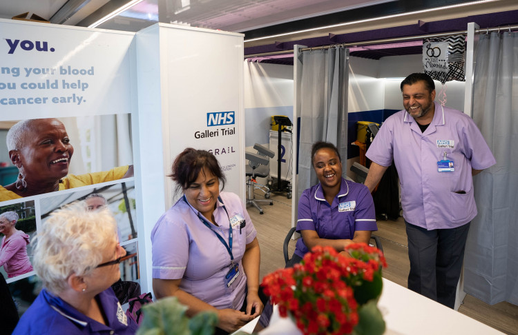 Staff at the NHS-Galleri blood test trial mobile unit.