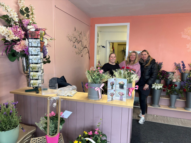 Wendy flanked by assistants Clare and Alfie at the new shop. 