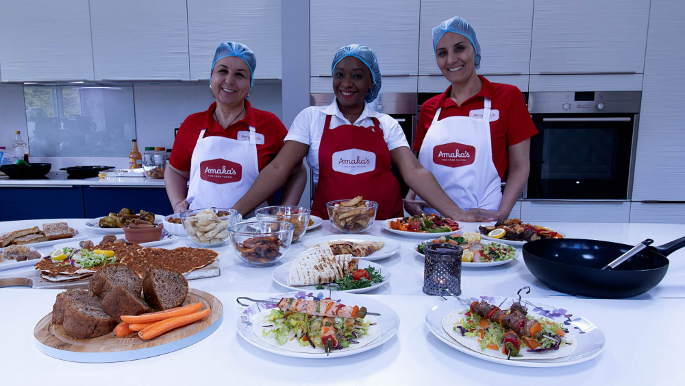 Amaka Lawton and staff with an array of tasty dishes available on the new menu, launching on Tuesday 30 April (Jan Roberts).