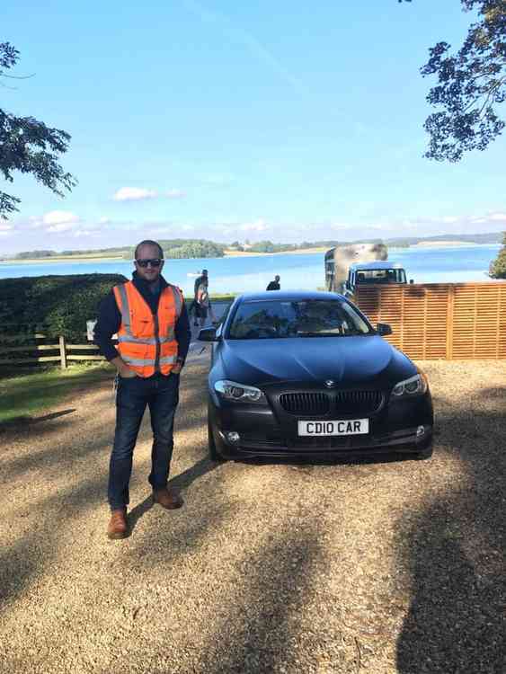 Jonathan Young - who works for Anglian Water as Rutland Water weddings, events and visitor services team leader - with one of the Emmerdale character's cars. Courtesy of Jonathan Young