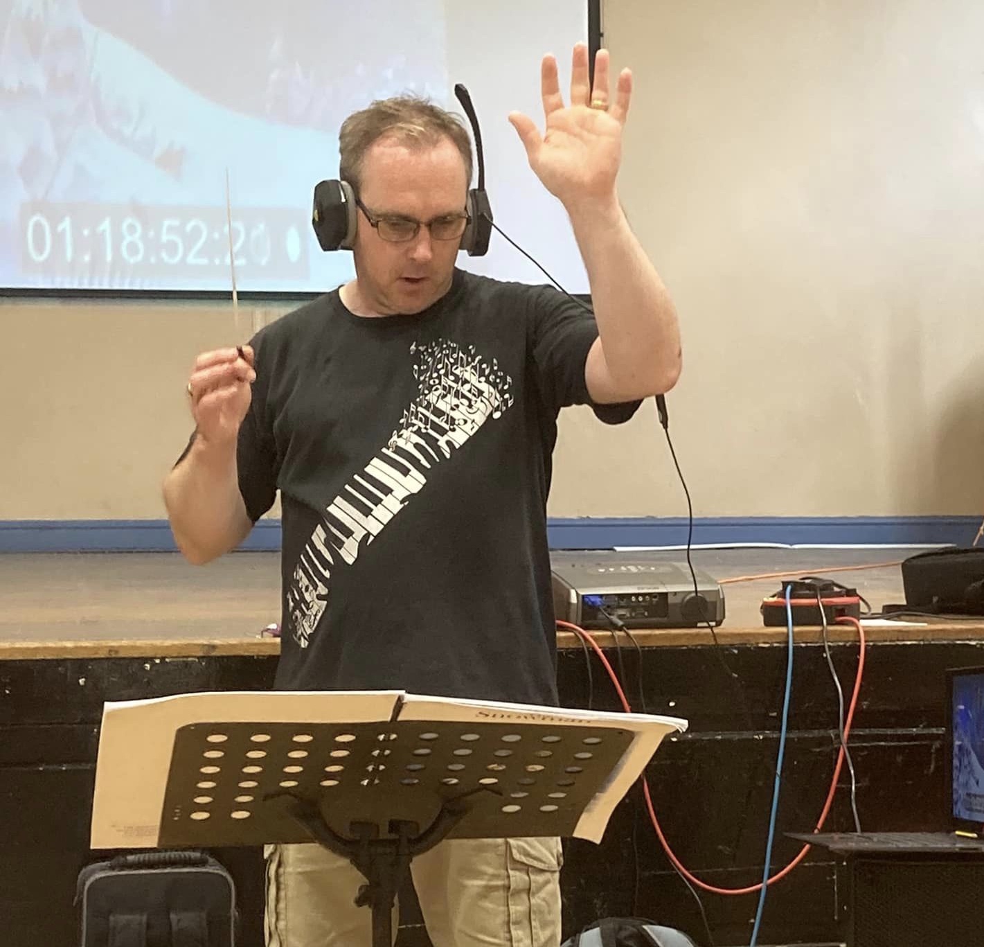 Chris Turner, Musical Director, conducting a rehearsal for The Snowman