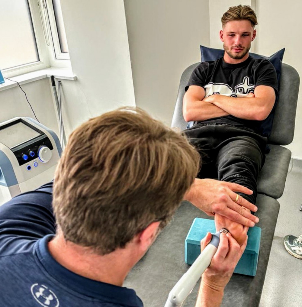 Crewe Alex midfielder, Joel Tabiner, receiving treatment from The Nantwich Clinic (Nub News).