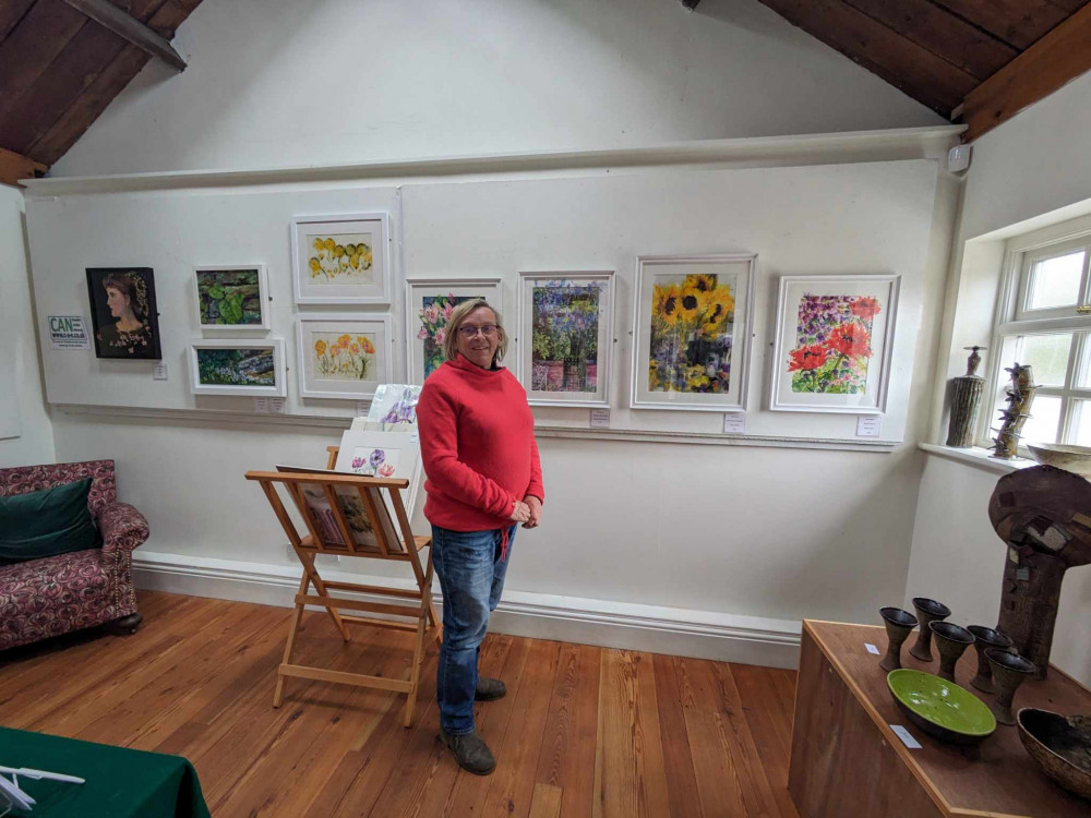 Chris House, an artist herself, in front of some of the work on display. (Photos: Nub News)  