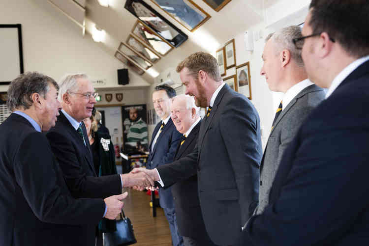 His Royal Highness meets representative from Oakham Rugby Club, discussing the development of the club and its partnership with Rutland Agricultural Society