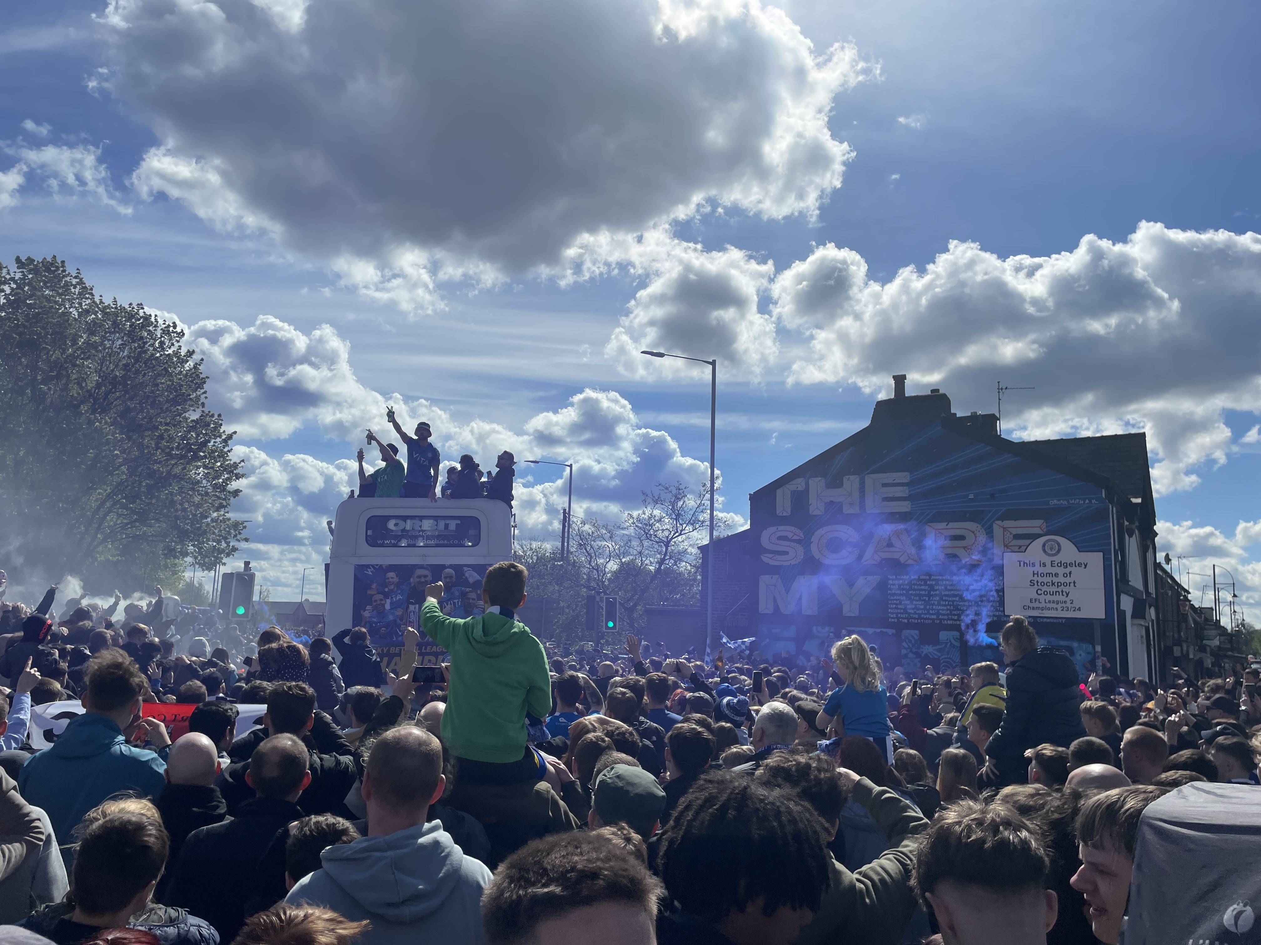 Blue smoke, singing, and fans as far as the eye can see - Sunday's promotion parade was a special one (Image - Alasdair Perry)