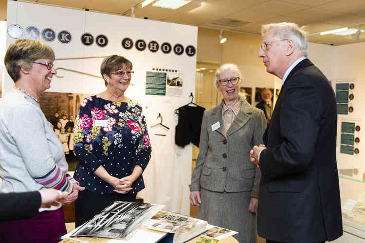 His Royal Highness meets the curators of Rutland County Museum's latest spotlight exhibition telling the history of Rutland's village schools