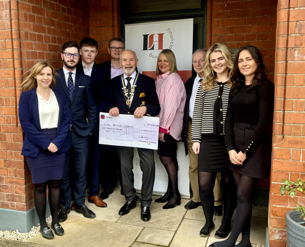 Ashby Royal British Legion chairman Dan Harrison sponsor Laura Hughes (centre), commitee member Graham Allman and LH Financial Planning staff at the Old Cottage Hospital in Ashby. Photos: Ashby Nub News