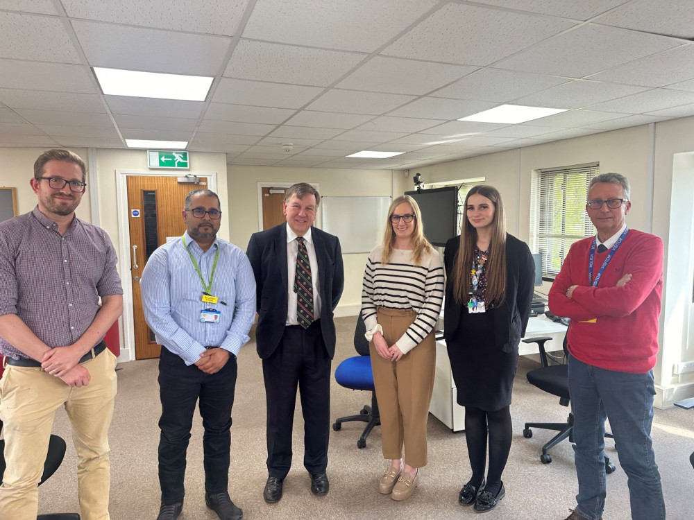 Pictured are Partners, Dr Ben Brazier and Dr Atul Lotlikar, Practice Manger Sophie Matthews, PA to the Partners Danielle Poole and Patients Group Representative, Lister Firkins.