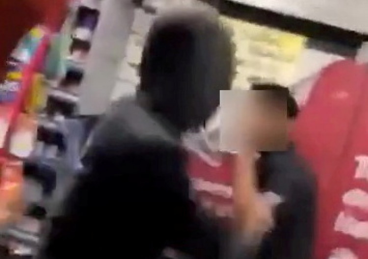 A group of youths uploaded footage of themselves attacking a garage worker in Stockport - they have since been brought to justice (Image via SWNS)