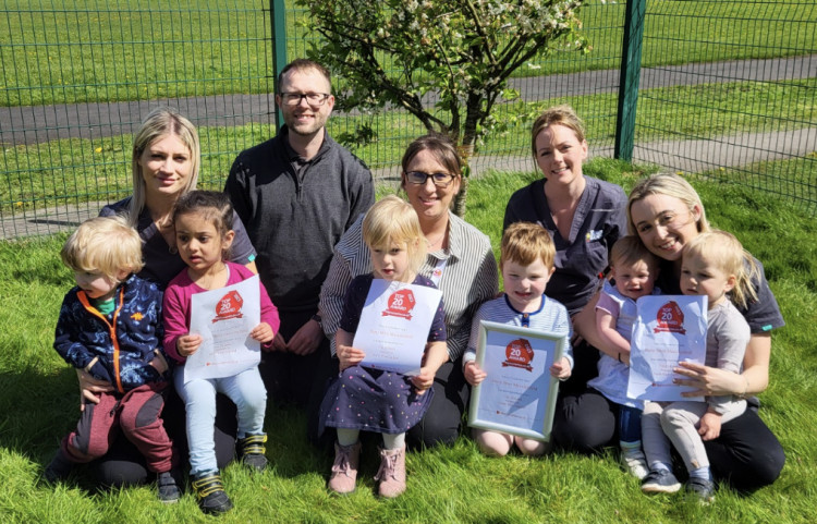 Current staff and pupils at the Poplar Road nursery. 