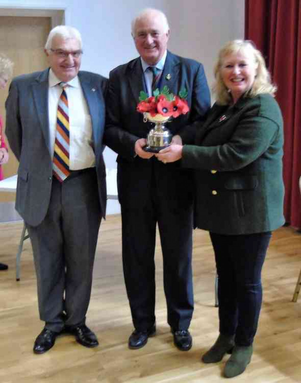 l-r: David Smith, Chairman Oakham Branch RBL, President of Leicestershire and Rutland Royal British Legion Colonel Robert Martin and Oakham Poppy Appeal organiser Gwyn Andrews. Photo: Terry Andrews