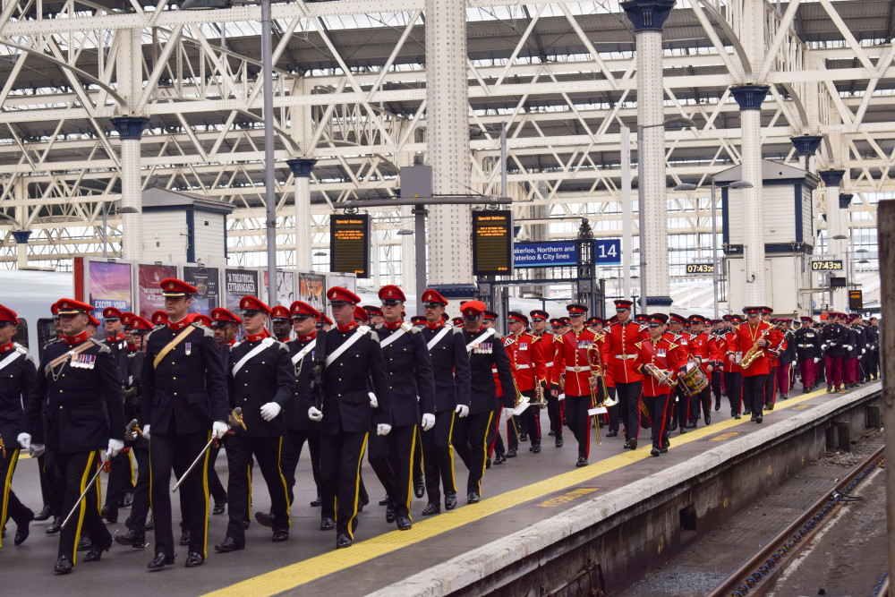 Armed Forces band prepares for the King and Queen's first year anniversary of the coronation in London Waterloo Station (credit: South Western Railway).