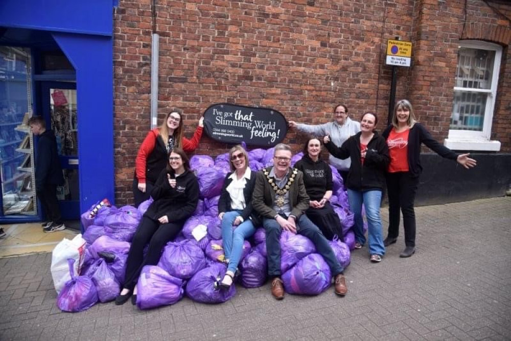 Bags of help - slimmers donate unwanted clothes to the Cancer Reserarch UK shop in Congleton. (Photo: Sharon Pipe)