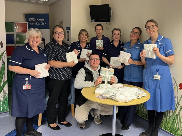 Easy Winning Limited's Callen Deighan with grateful staff of Stepping Hill Hospital's neonatal ward. (Image - Easy Winning) 