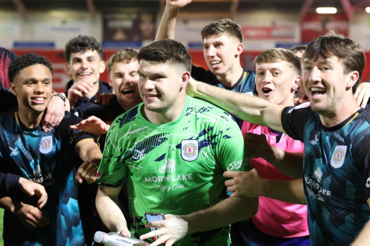 Max Stryjek saved two penalties in a tense shootout and was booked after throwing a Doncaster water bottle of penalty tips into the crowd of Crewe fans (Crewe Alex).