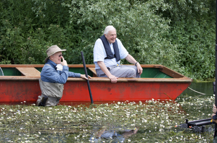 Sir David Attenborough and Mike Gunton filming for The Green Planet on the River Avon in Hampshire in June 2019.   © Ella Morgan / BBC Studios Natural History Unit