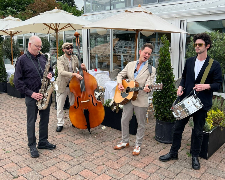 Oliver Darling, the leading musician of the festival's roaming jazz band, performing at The Wharf. (Photo: The Wharf Teddington)