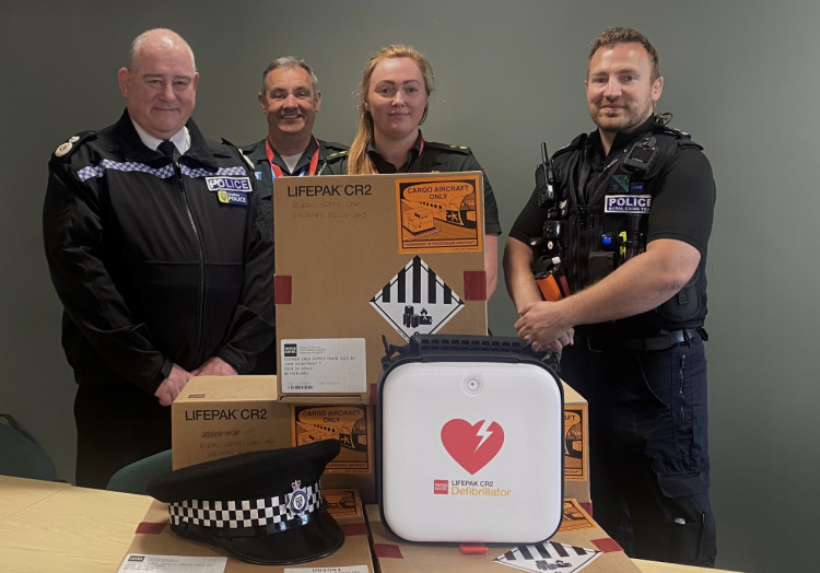 Members of NWAS with Deputy Chief Constable Chris Armitt and Sergeant Rob Simpson of the Rural Crime Team during the handover. (Image - Cheshire Police Rural Crime Team)