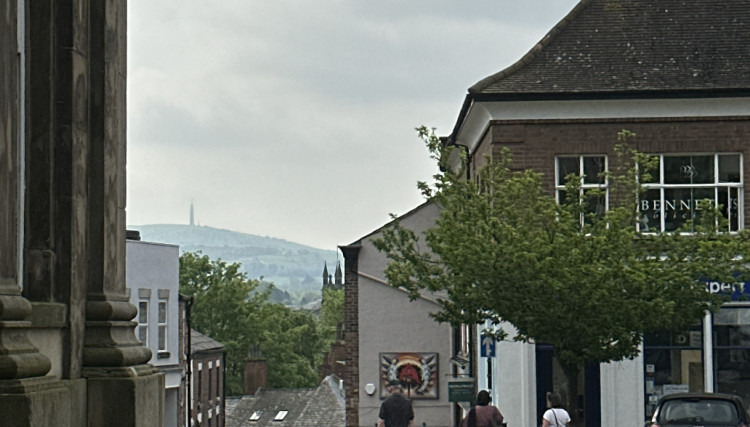 Macclesfield town centre with rolling hills and Church Street rooftops pictured in the distance. (Image - Macclesfield Nub News) 