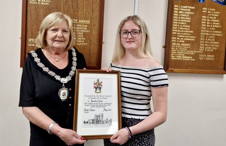 Outgoing Mayor, Cllr Avril Wilson, presents the Ashby de la Zouch Town Council Civic Youth Award for 2023 to Annabel Fraser. Photos: Ashby de la Zouch Town Council