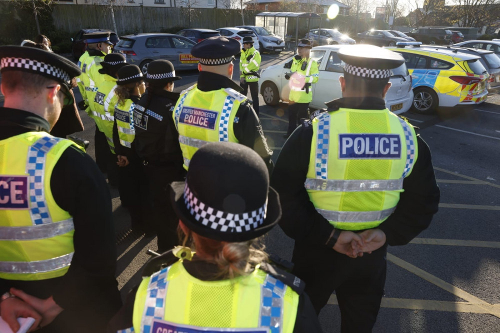 Officers from Greater Manchester Police have made a 'significant arrest' and removed two knives from the streets (Image - GMP)