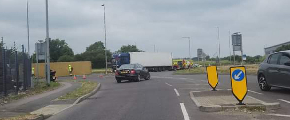 The roundabout was blocked after the HGV overturned.