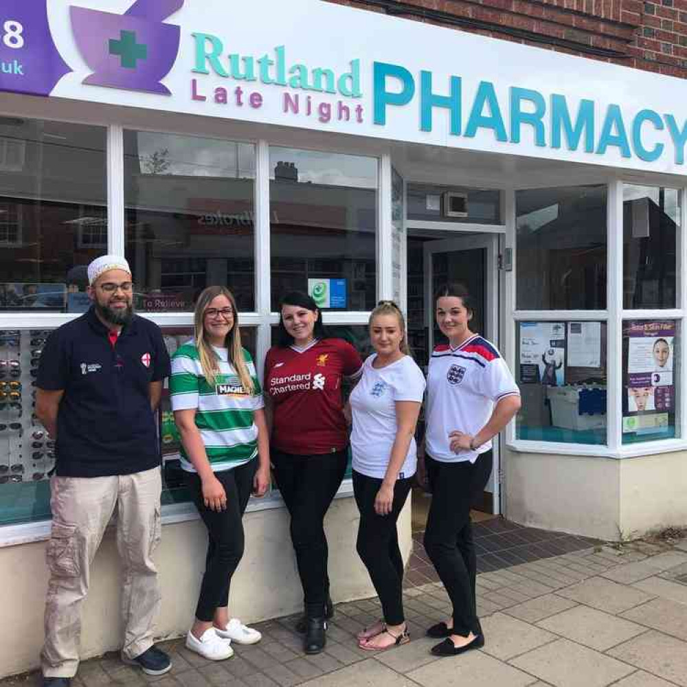 Pharmacy manager Huzefa Broachwalla (left) and members of Rutland Late Night Pharmacy team