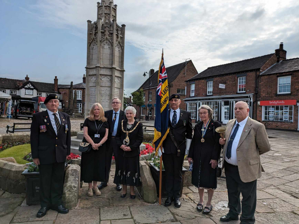 Sandbach's new town crier, Dave Hypson, (far right) at this morning's proclamation at Sandbach War Memorial. (Photo: Nub News)