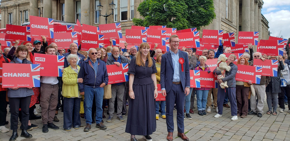 Angel Rayner and Macclesfield Labour parliamentary candidate Tim Roca, with supporters. 