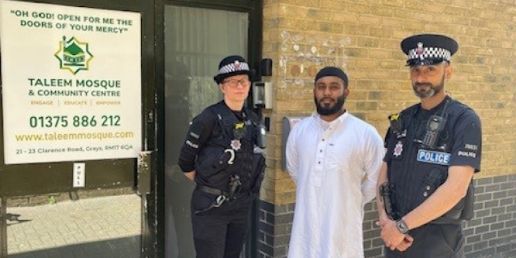 Police officers at the mosque on  Clarence Road in Grays.