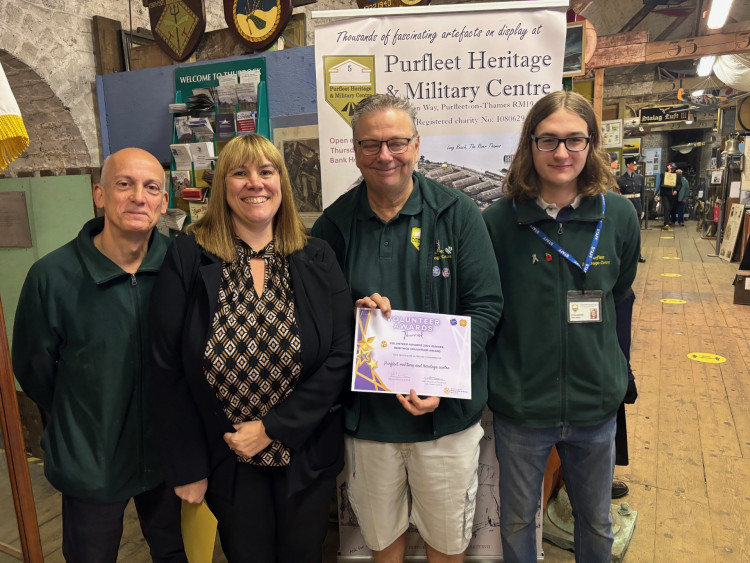 Joanne Potter from the CVS presented the award to Paul Hounsell, Dave Belcher and Ollie Mills on behalf of all the volunteers at the centre on Centurian Way, Pirfleet-on-Thames.