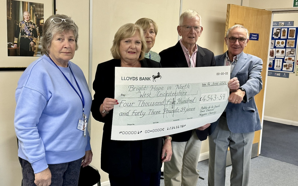 Cllr Avril Wilson presents the cheque to representatives of Bright Hope Hospice. Photos: Ashby Nub News