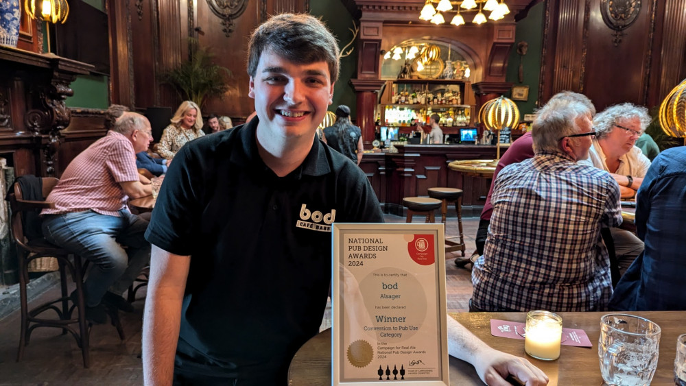 Bod Alsager manager Jason Dunn with the award and a pint of Titanic Plum Porter. (Photo: Titanic Brewery)