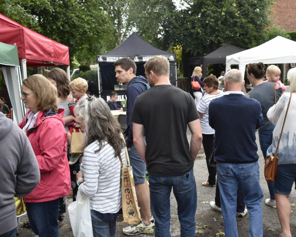 A summer fair will take place at the Seashell Trust in Cheadle Hulme, featuring a Worker Bee Market, rides, superheroes, and much more (Image - Worker Bee Markets)