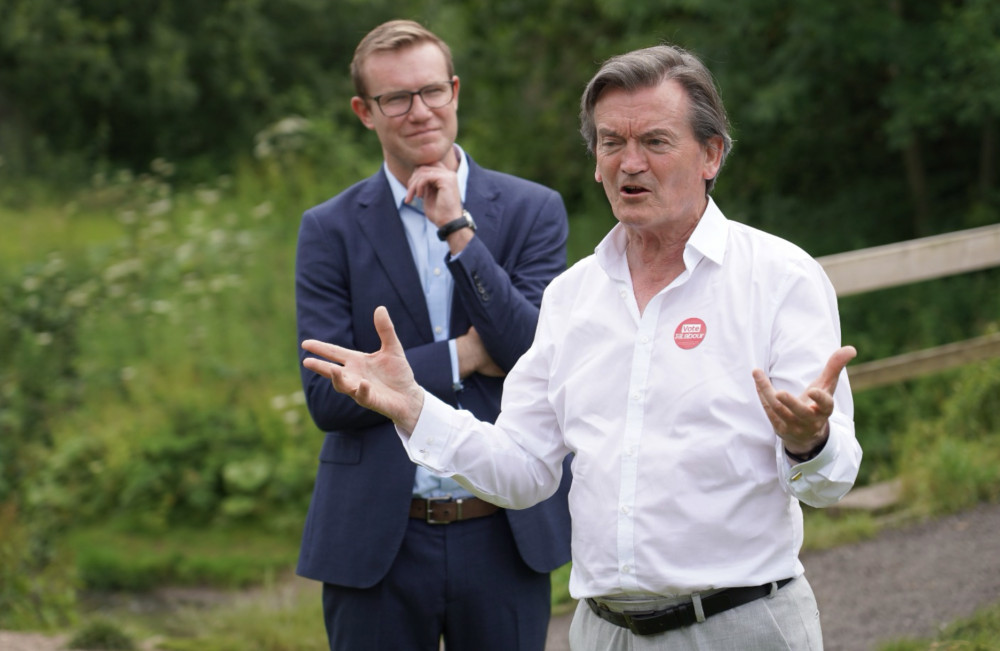 Derry-born rockstar Feargal Sharkey OBE, pictured in front of Macclesfield's Labour candidate for the general election Tim Roca. 