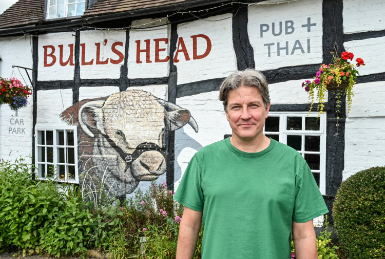 Martin Peel paid a local artist £1,200 to have the 8ft mural emblazoned on the side of The Bull's Head (image by SWNS)