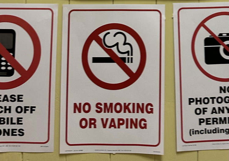 A no smoking sign at a polling station. 