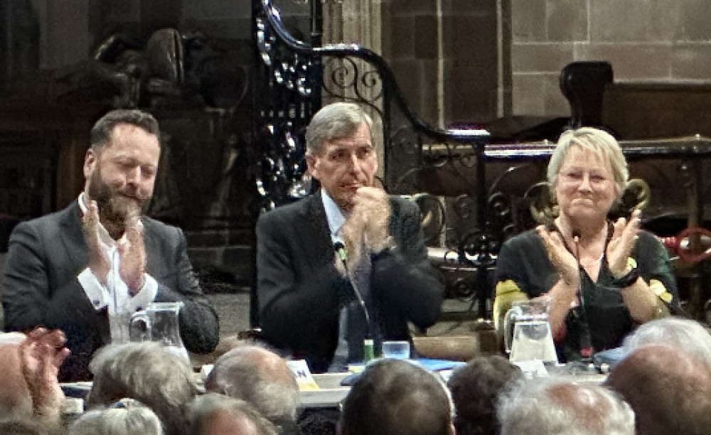 David Rutley (centre) is the Conservative candidate in this Thursday's general election. He is pictured applauding at the end of the hustings, next to the Liberal Democrat Neil Christian (left) and Green candidate Amanda Iremonger (right). 