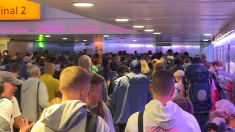 Chaos at Heathrow Airport Terminal 2 as passengers fear missing flights amid suspicious item scare (credit: SWNS).