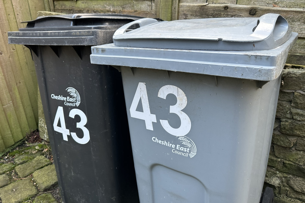 A Cheshire East Council black bin (left) in Bollington. (Image - Macclesfield Nub News) 