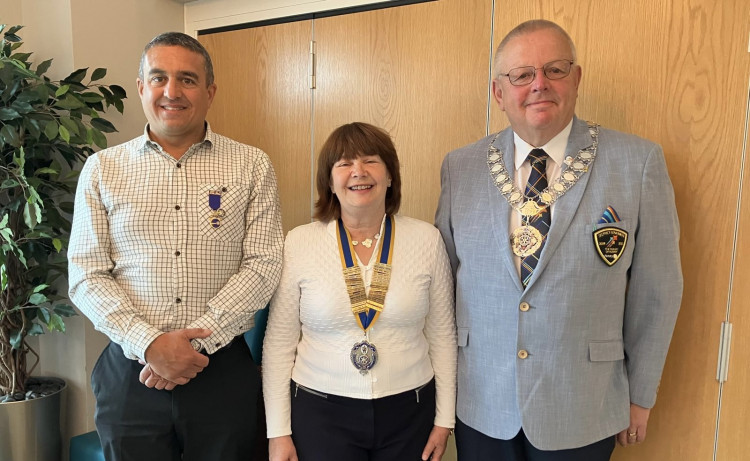 Mark Arjoo, Margaret Hawksworth and Rotary District Governor, Chris Knight at the Rotary Club induction. Photo: Supplied