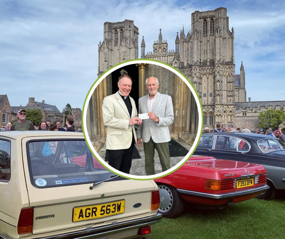 Chair of the Mendip Tour, Roger Dollins (right) presented the Dean of Wells, The Very Revd Toby Wright (left) with a cheque outside the West Front of the Cathedral. (Wells Cathedral) 