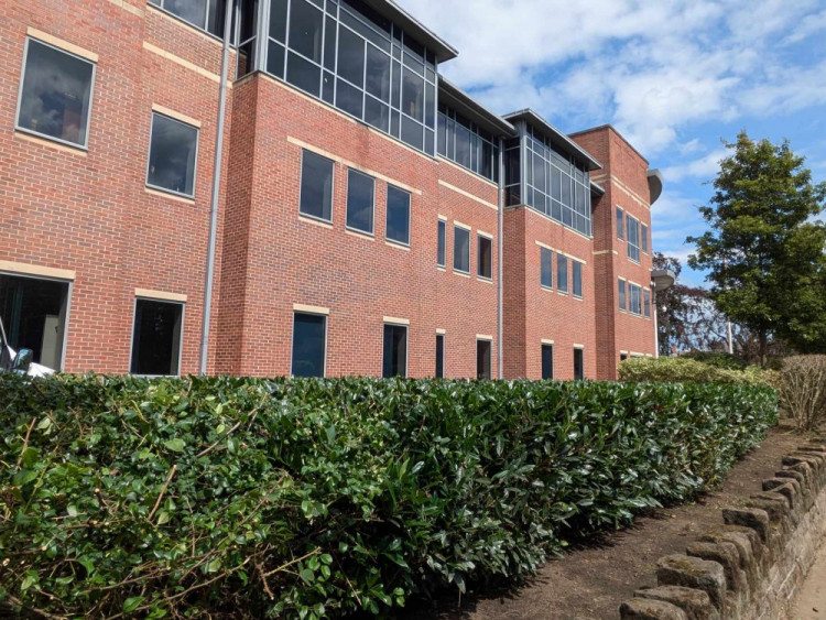 Readers have complained about the unkempt state of the area in front of Cheshire East's Westfields building in Sandbach but bushes have now been trimmed. (Photo: Nub News)