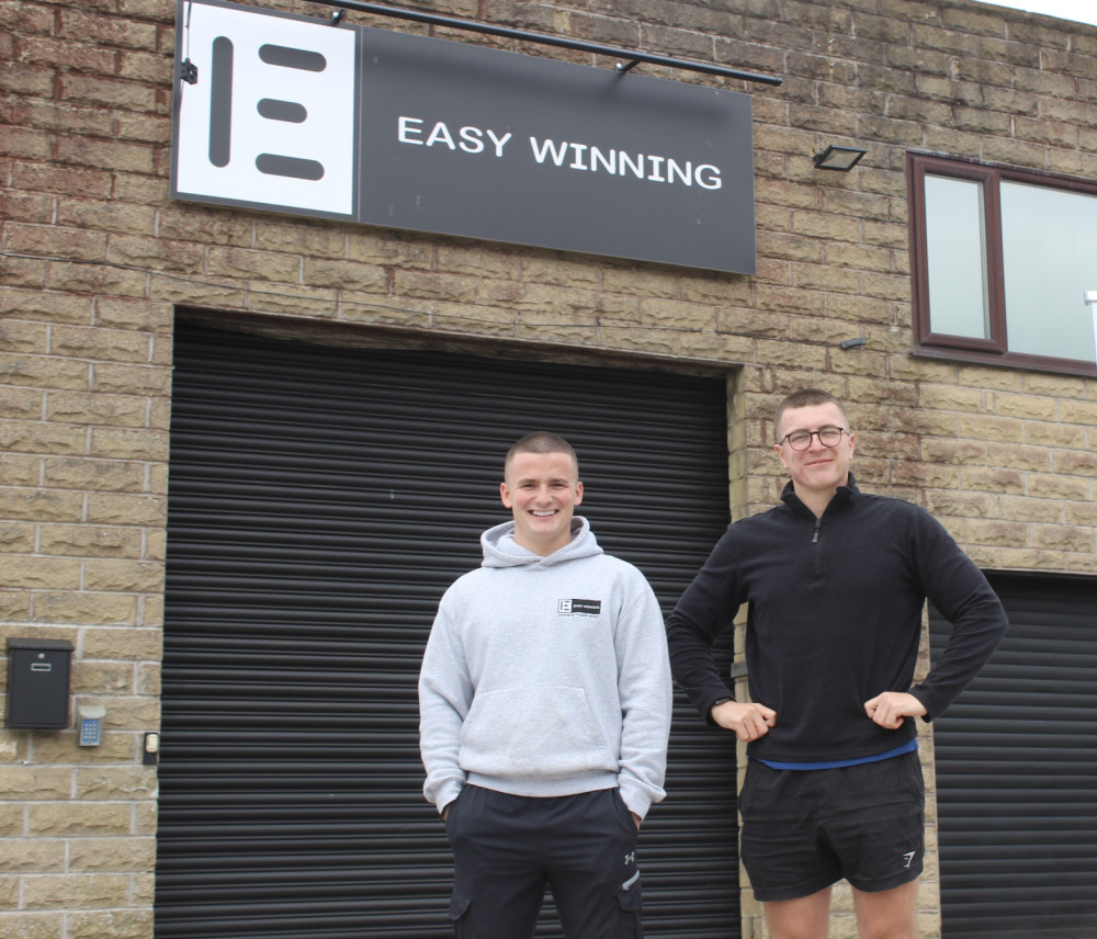 Easy Winning Limited staff Charles Edwards and Callen Deighton, outside their HQ. 