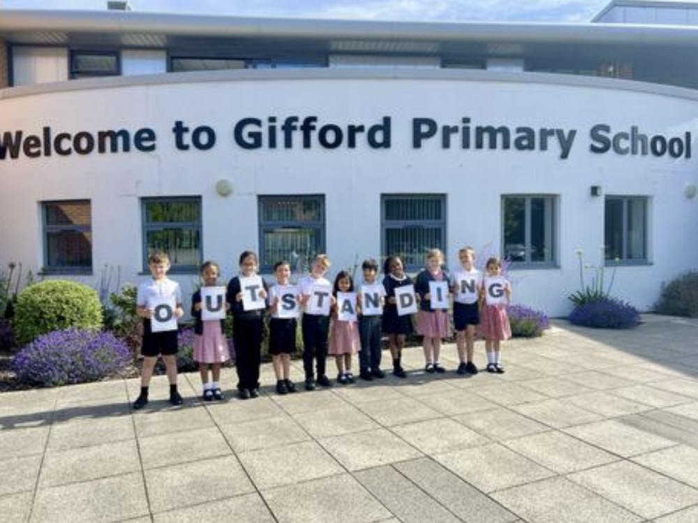 Students from Gifford Primary School celebrate receiving and 'outstanding' rating from Ofsted (credit: Gifford Primary School).