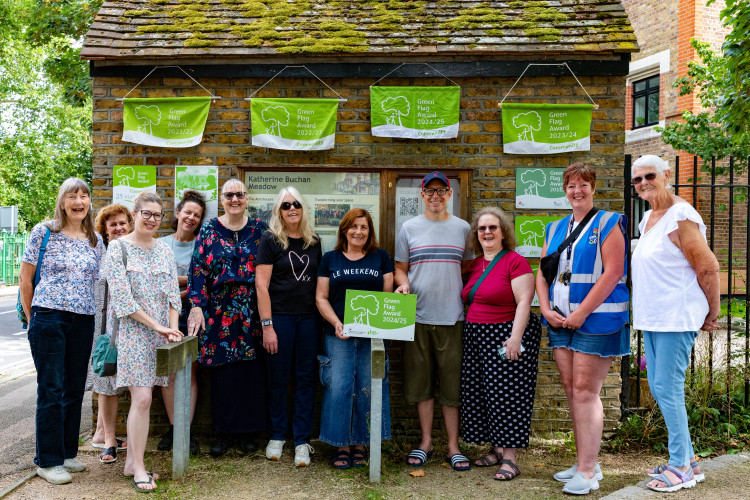 Katherine Buchan Meadow volunteers celebrate its seventh Green Flag Award in Hanwell, Ealing (credit: Katherine Buchan Meadow).