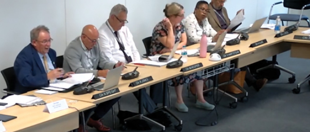 Cllr Neil Speight, left, reveals the waiting times to members at the scrutiny meeting. 