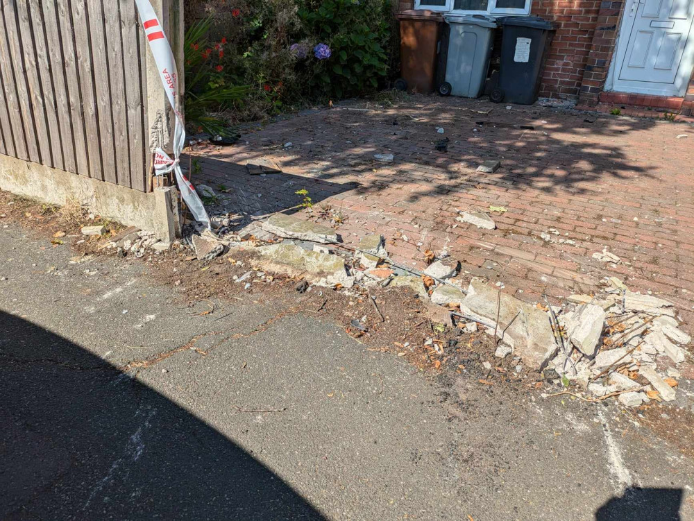 The wall leading to a property was damaged after a vehicle collided with a wall. (Photo: Nub News)