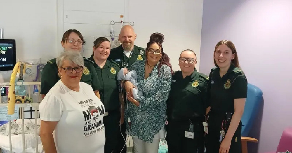 West Midlands Ambulance Service crews reunited with Louise, Denise and baby Lincoln (West Midlands Ambulance Service).