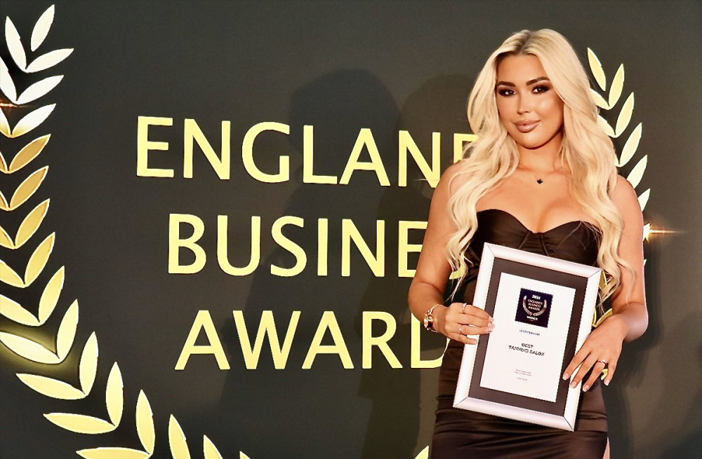 Milly Baker with her award for Best Tanning Salon in Leicestershire. Photos: Supplied